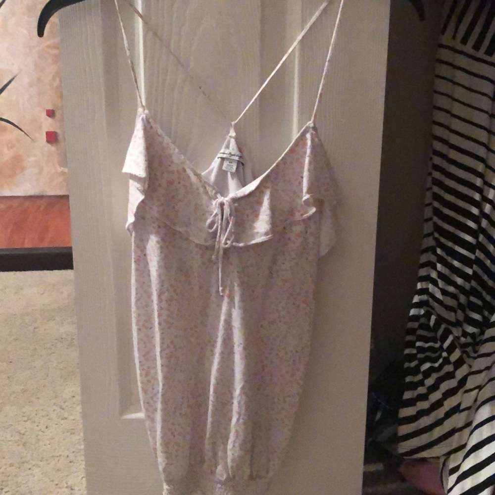 Cute white and orange floral tank top.